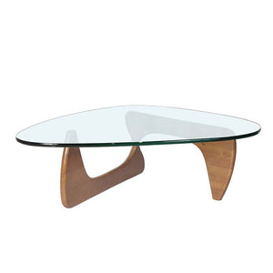 Modern triangle shaped glass coffee table .